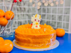 Glazed in a coat of mandarin orange sauce, the sponge cake is light and airy with uplifting citrusy undertones