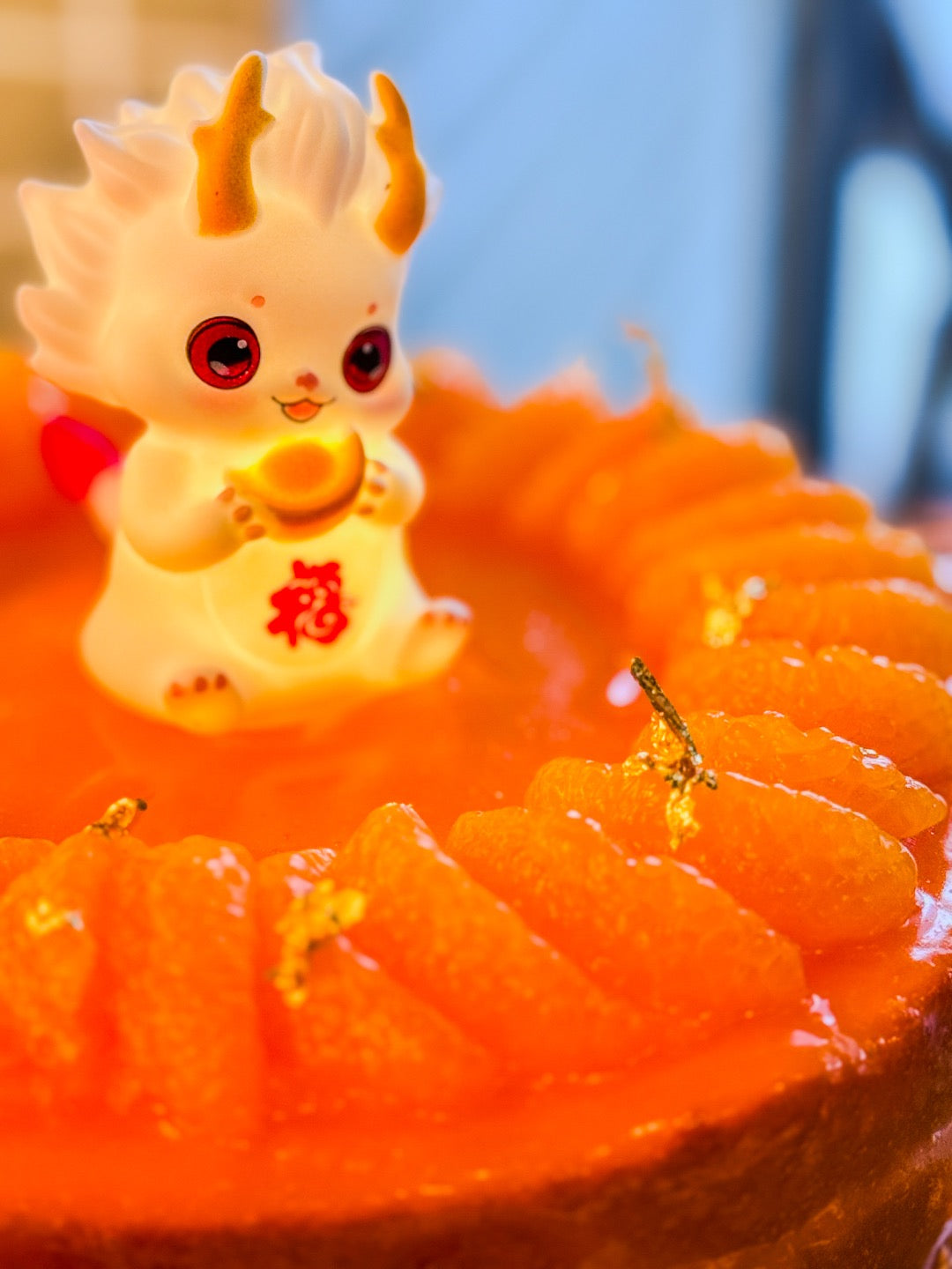 Every cake comes adorned with edible gold leaf and a baby dragon cake topper that lights up