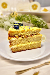 The moist butter cake is layered with tangy lemon curd.