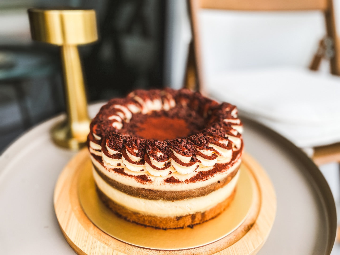 The Taz-Ra-Misu is a luscious tiramisu cake that reimagines tradition with a spirited twist of rum and coffee liqueur.